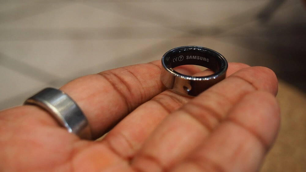 Person Hold a Smart Ring